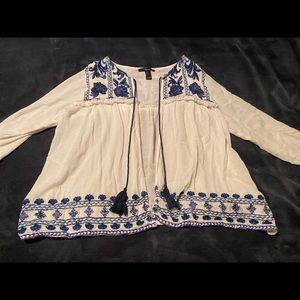 White and blue pull over